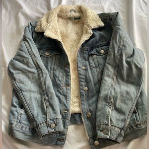 Fur lined light wash jean jacket